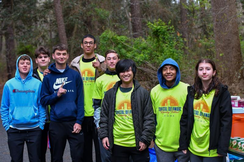 The Sussex Central track team works the water stop. Shown are (l-r) Brock Elliott, Zach Ortiz, Brody Polakas, Zeke Ro, Tyler Stauffer, Joe Villareal, Jimmy Velasquez and Zoe Cullen.